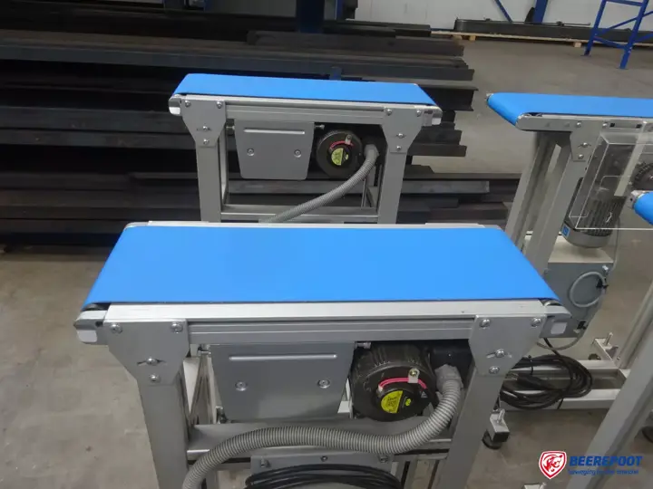 Kleine transportbanden met blauwe PU-band